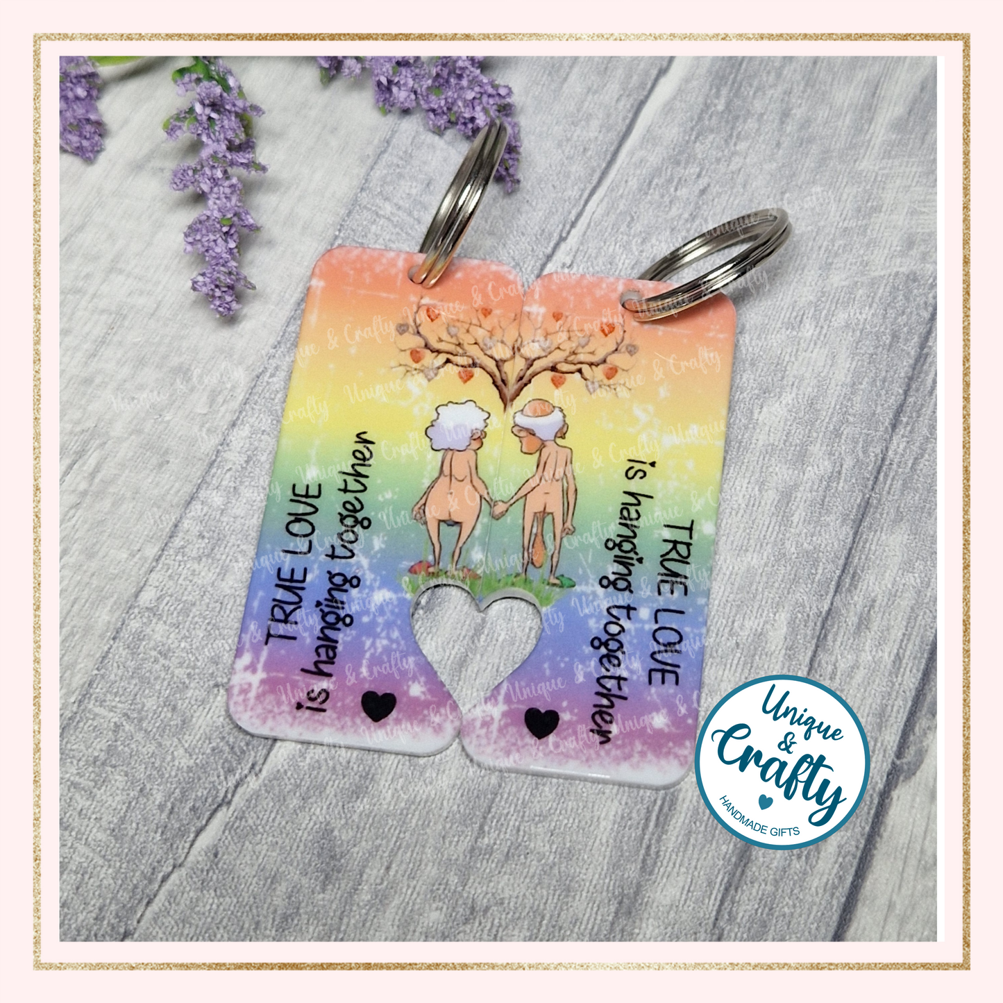 Dual heart keyring. Hanging together